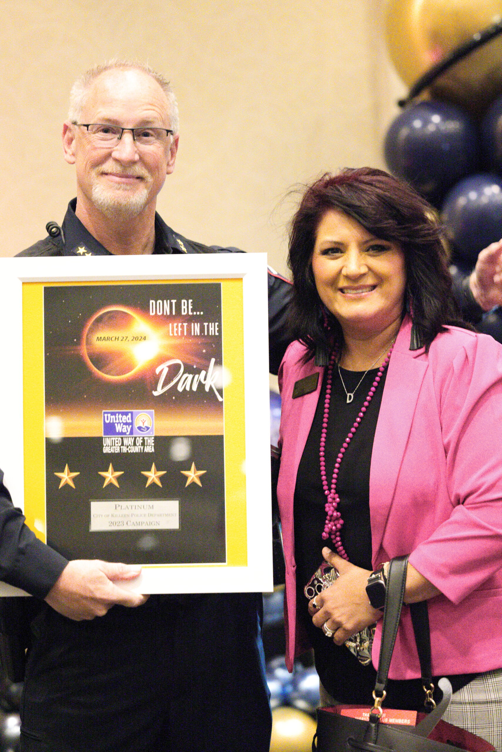 Assistant Police Chief Jeff Donohue Accepts award.